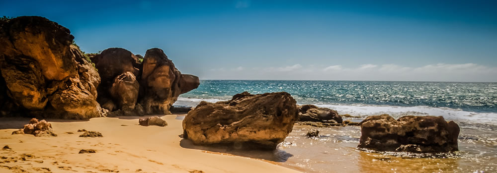 California North Coast featuring giant rocks, sand, and the ocean